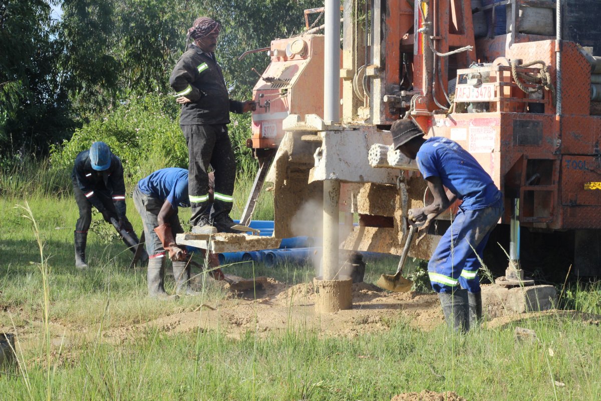 Borehole Drilling Men at Work